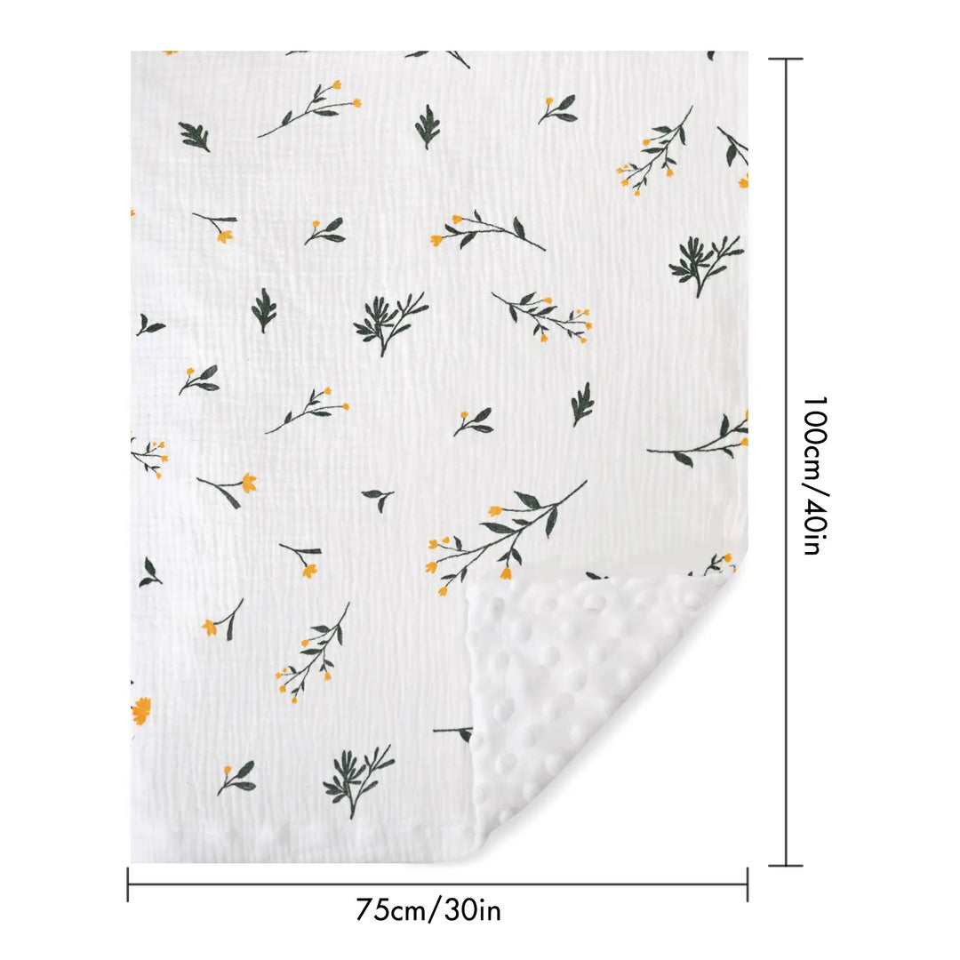 A baby blanket with a floral print, displayed with dimensions of 100 cm by 75 cm, perfect for nursery use.