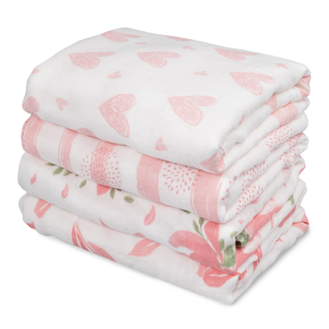 Stack of four pink-themed muslin swaddle blankets with various patterns, including hearts, floral, stripes, and leaves. Soft, breathable fabric for babies.